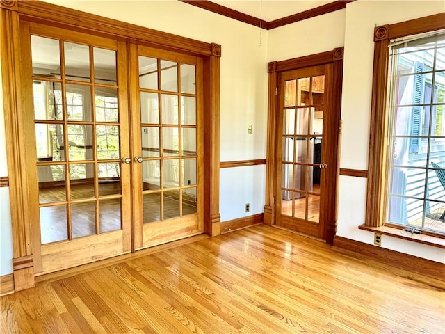 1214 Chislett St, Morningside, PA 15206 - doorway featuring baseboards, ornamental molding, french doors, and light wood-type flooring