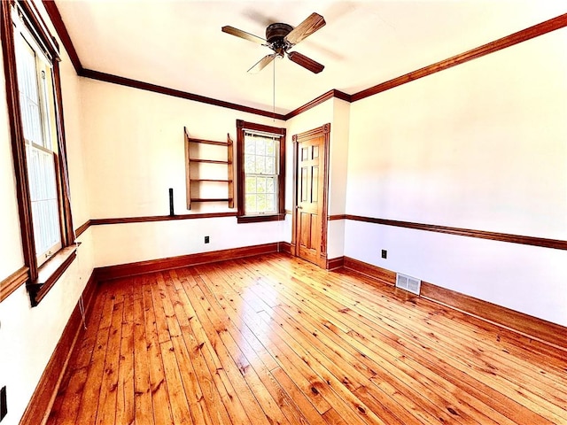 1214 Chislett St, Morningside, PA 15206 - empty room with hardwood / wood-style floors, a ceiling fan, baseboards, visible vents, and ornamental molding