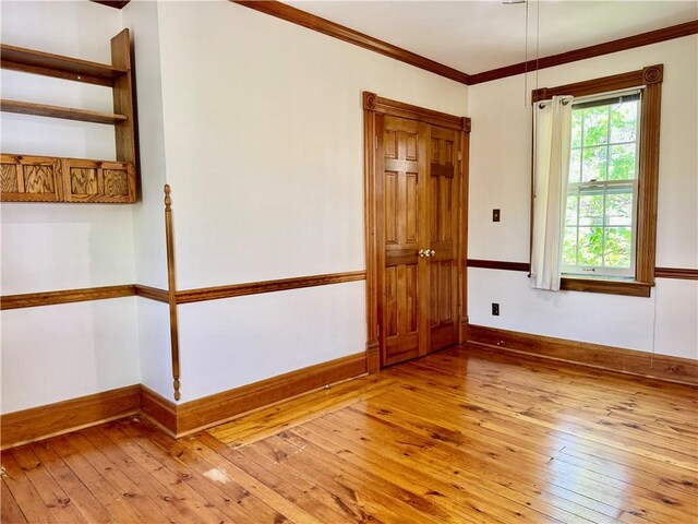 1214 Chislett St, Morningside, PA 15206 - spare room featuring crown molding, baseboards, and light wood finished floors