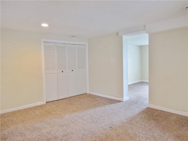 776 W Vine St, Mount Pleasant Boro, PA 15666 - unfurnished bedroom featuring a closet, baseboards, carpet flooring, and recessed lighting