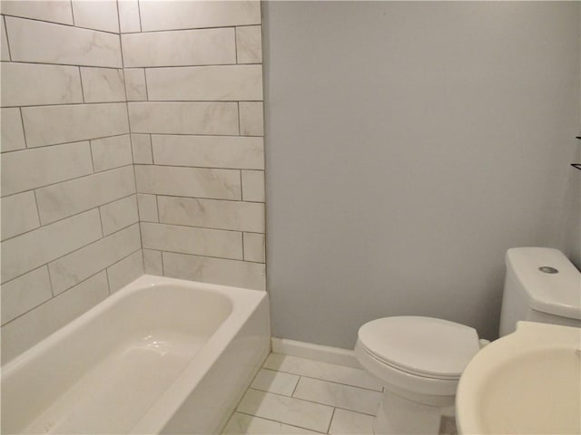 776 W Vine St, Mount Pleasant Boro, PA 15666 - bathroom with toilet, baseboards, a sink, and tile patterned floors