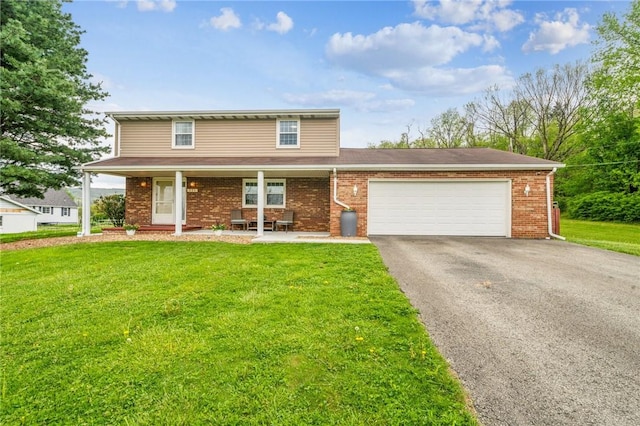 view of front facade with a porch, driveway, brick siding, a front lawn, and an attached garage