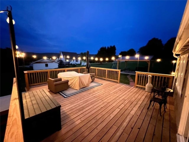 view of deck at twilight