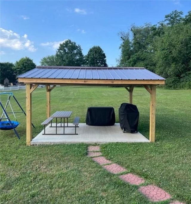 surrounding community featuring a gazebo, a yard, and a patio area