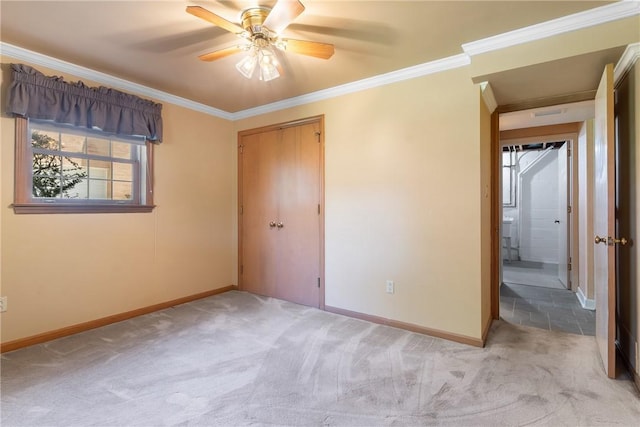 2650 Quail Hill Dr, Upper St Clair, PA 15241 - unfurnished bedroom featuring crown molding, light carpet, baseboards, a closet, and ceiling fan