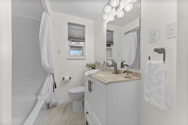 full bathroom featuring vanity, toilet, a chandelier, and marble finish floor