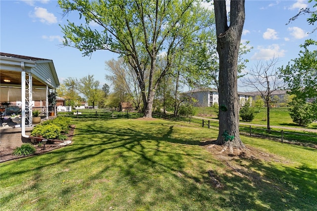 view of yard featuring fence