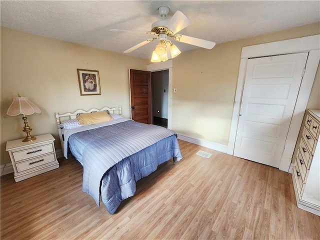828 Butler Ave, New Castle/4Th, PA 16101 - bedroom featuring light wood finished floors, a ceiling fan, baseboards, visible vents, and a closet