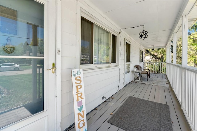wooden deck featuring a porch