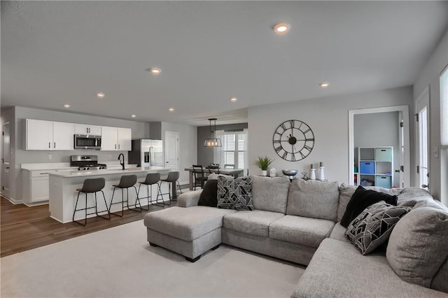 418 Fosse Ct, Lancaster Twp, PA 16037 - living room with recessed lighting and dark wood finished floors