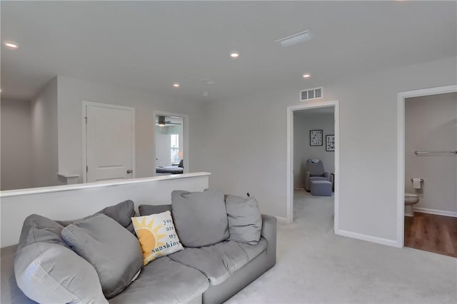 418 Fosse Ct, Lancaster Twp, PA 16037 - living room featuring light colored carpet, baseboards, visible vents, and recessed lighting