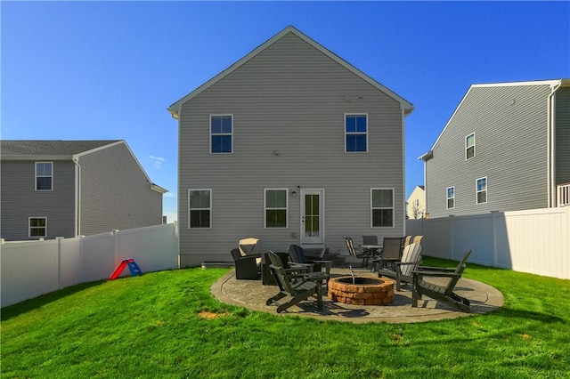 418 Fosse Ct, Lancaster Twp, PA 16037 - rear view of house with a fenced backyard, a yard, and an outdoor fire pit