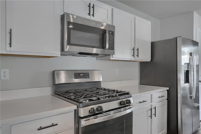418 Fosse Ct, Lancaster Twp, PA 16037 - kitchen with light countertops, appliances with stainless steel finishes, and white cabinets