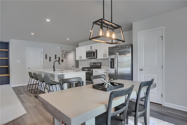 418 Fosse Ct, Lancaster Twp, PA 16037 - dining space featuring recessed lighting, baseboards, and wood finished floors