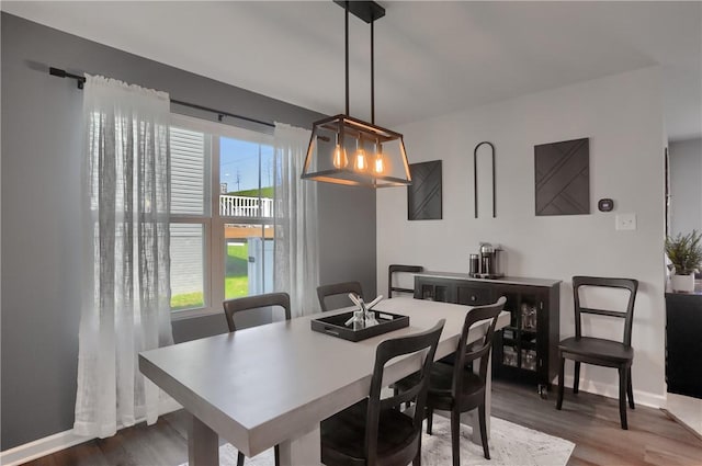 418 Fosse Ct, Lancaster Twp, PA 16037 - dining space with baseboards and wood finished floors