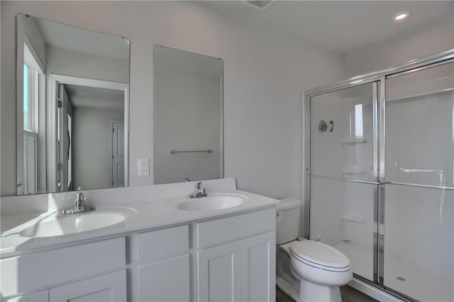 418 Fosse Ct, Lancaster Twp, PA 16037 - bathroom featuring a sink, toilet, and a shower stall