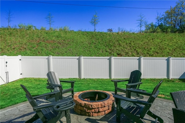 418 Fosse Ct, Lancaster Twp, PA 16037 - view of patio / terrace featuring a fenced backyard and an outdoor fire pit