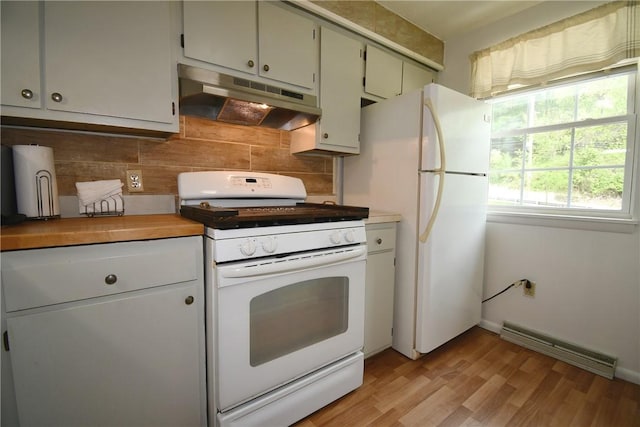kitchen with visible vents, tasteful backsplash, light wood finished floors, under cabinet range hood, and white appliances