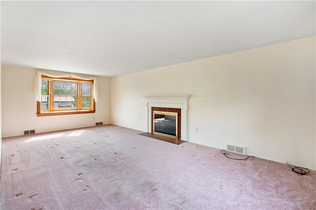 327 Pinehaven Dr, Upper St Clair, PA 15241 - unfurnished living room with visible vents, a fireplace with flush hearth, and carpet