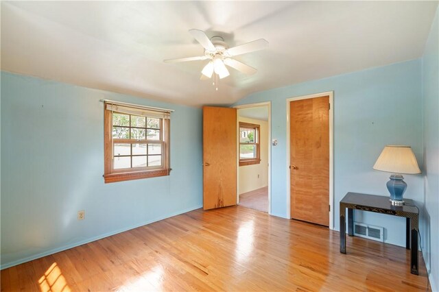 327 Pinehaven Dr, Upper St Clair, PA 15241 - unfurnished room with visible vents, baseboards, ceiling fan, light wood finished floors, and vaulted ceiling