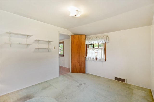 327 Pinehaven Dr, Upper St Clair, PA 15241 - spare room featuring visible vents, vaulted ceiling, and light colored carpet