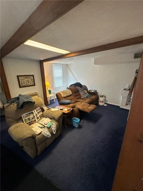 interior space featuring beam ceiling