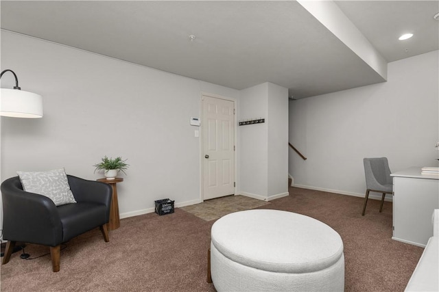 living area with recessed lighting, baseboards, and carpet