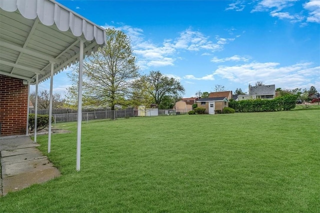 view of yard with fence