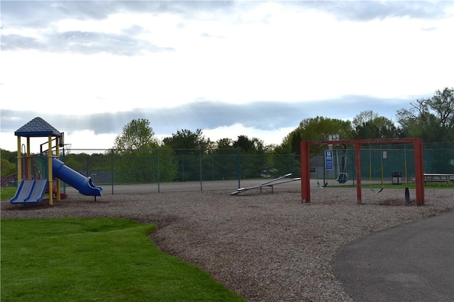 communal playground featuring fence