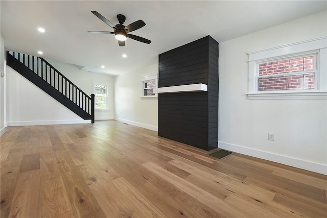 1203 Berkshire Ave, Brookline, PA 15226 - unfurnished living room featuring light wood-style flooring, stairs, a ceiling fan, baseboards, and recessed lighting