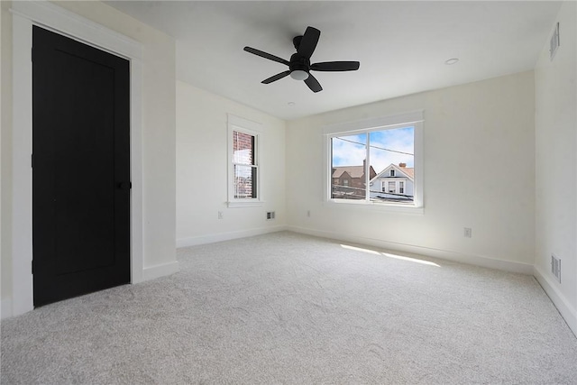 1203 Berkshire Ave, Brookline, PA 15226 - spare room featuring baseboards, a ceiling fan, carpet flooring, and visible vents
