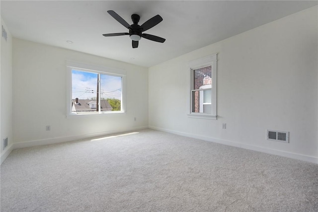 1203 Berkshire Ave, Brookline, PA 15226 - carpeted spare room featuring a healthy amount of sunlight, baseboards, and visible vents