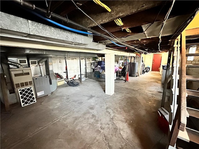 unfinished basement with gas water heater
