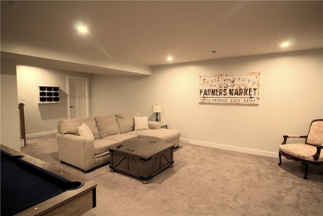 living room with baseboards, recessed lighting, and light colored carpet
