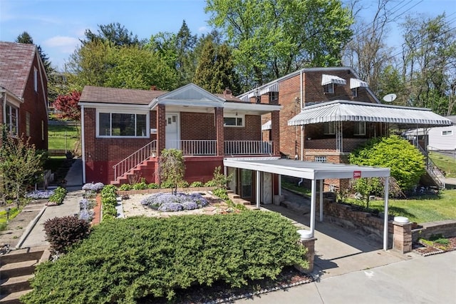 view of front of house with brick siding