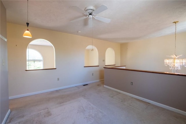 1437 Yorktown Dr, Cecil, PA 15055 - unfurnished room with baseboards, carpet, and ceiling fan with notable chandelier