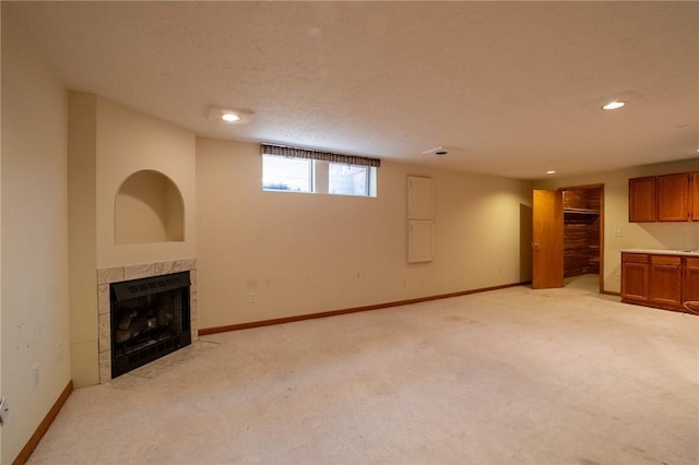 1437 Yorktown Dr, Cecil, PA 15055 - unfurnished living room with a tiled fireplace, baseboards, recessed lighting, and light colored carpet