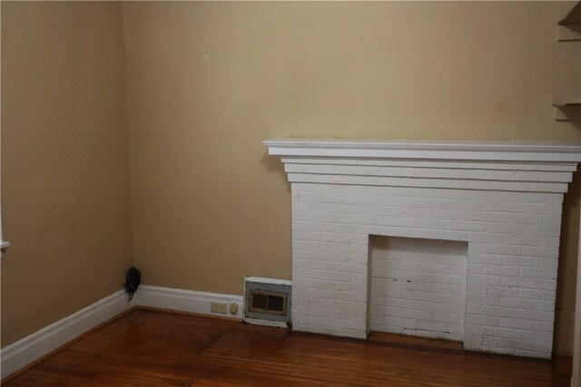 363 S 6th St, Indiana Boro Ind, PA 15701 - interior details featuring baseboards, wood finished floors, and a fireplace