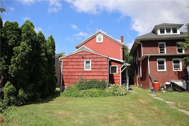 363 S 6th St, Indiana Boro Ind, PA 15701 - rear view of property with brick siding and a yard