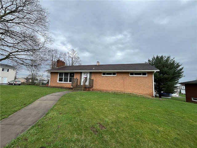 246 Anderson Ave, Indiana Boro Ind, PA 15701 - single story home with brick siding, a front lawn, and a chimney