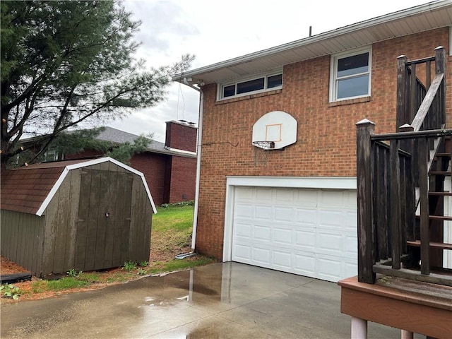 246 Anderson Ave, Indiana Boro Ind, PA 15701 - exterior space with an outbuilding, brick siding, a storage unit, concrete driveway, and an attached garage
