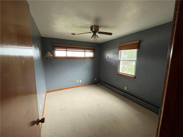 246 Anderson Ave, Indiana Boro Ind, PA 15701 - spare room with baseboards, ceiling fan, baseboard heating, and a wealth of natural light
