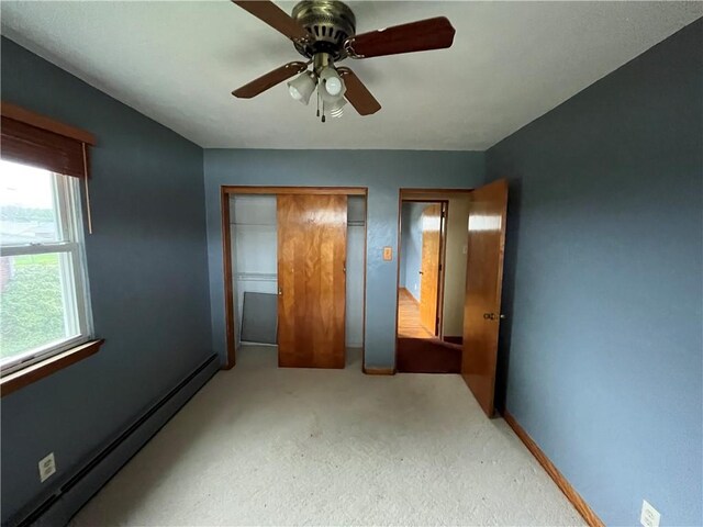 246 Anderson Ave, Indiana Boro Ind, PA 15701 - unfurnished bedroom with carpet flooring, baseboards, a baseboard heating unit, and multiple windows