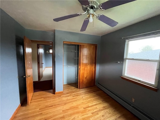 246 Anderson Ave, Indiana Boro Ind, PA 15701 - unfurnished bedroom featuring ceiling fan, light wood-style flooring, baseboards, a baseboard heating unit, and a closet