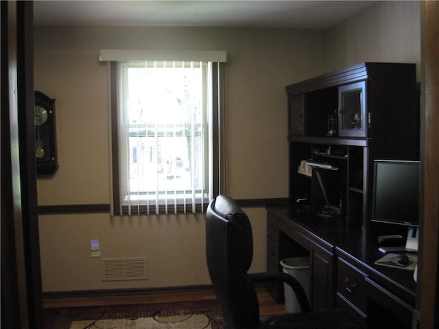 office area featuring visible vents