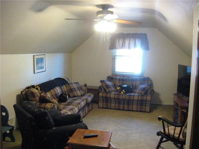 living room with ceiling fan, carpet flooring, and lofted ceiling