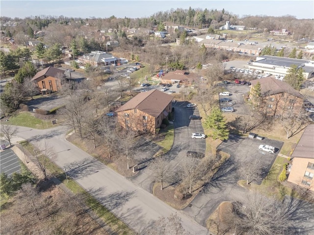 birds eye view of property with a residential view