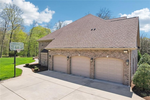 view of side of property with roof with shingles, a lawn, and brick siding
