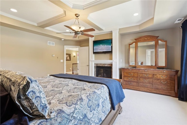 bedroom with visible vents, a glass covered fireplace, beam ceiling, coffered ceiling, and carpet