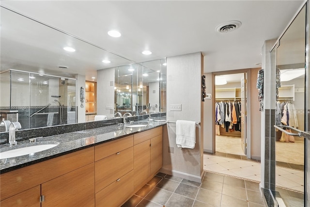 111 Grandview Ave Unit 801, Mt Washington, PA 15211 - full bathroom with tile patterned flooring, a sink, a spacious closet, and a shower stall